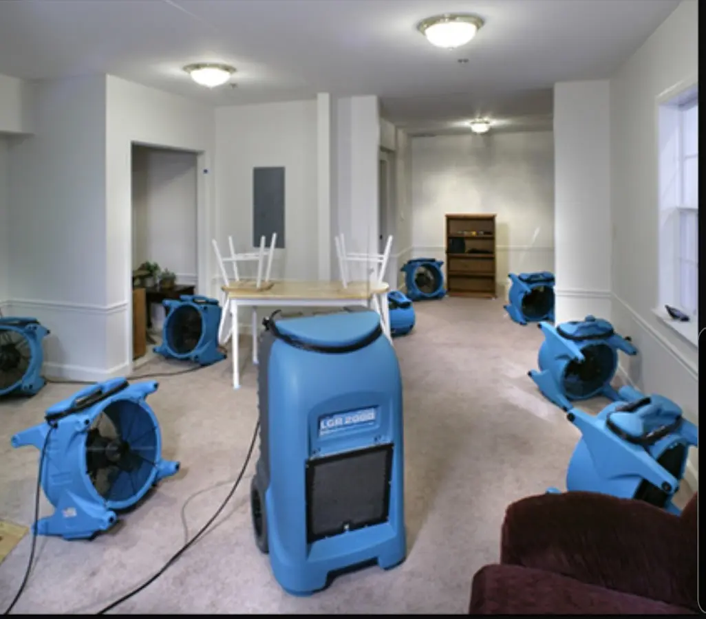 Air movers and dehumidifier setup for Water Damage Restoration in Sand Lake